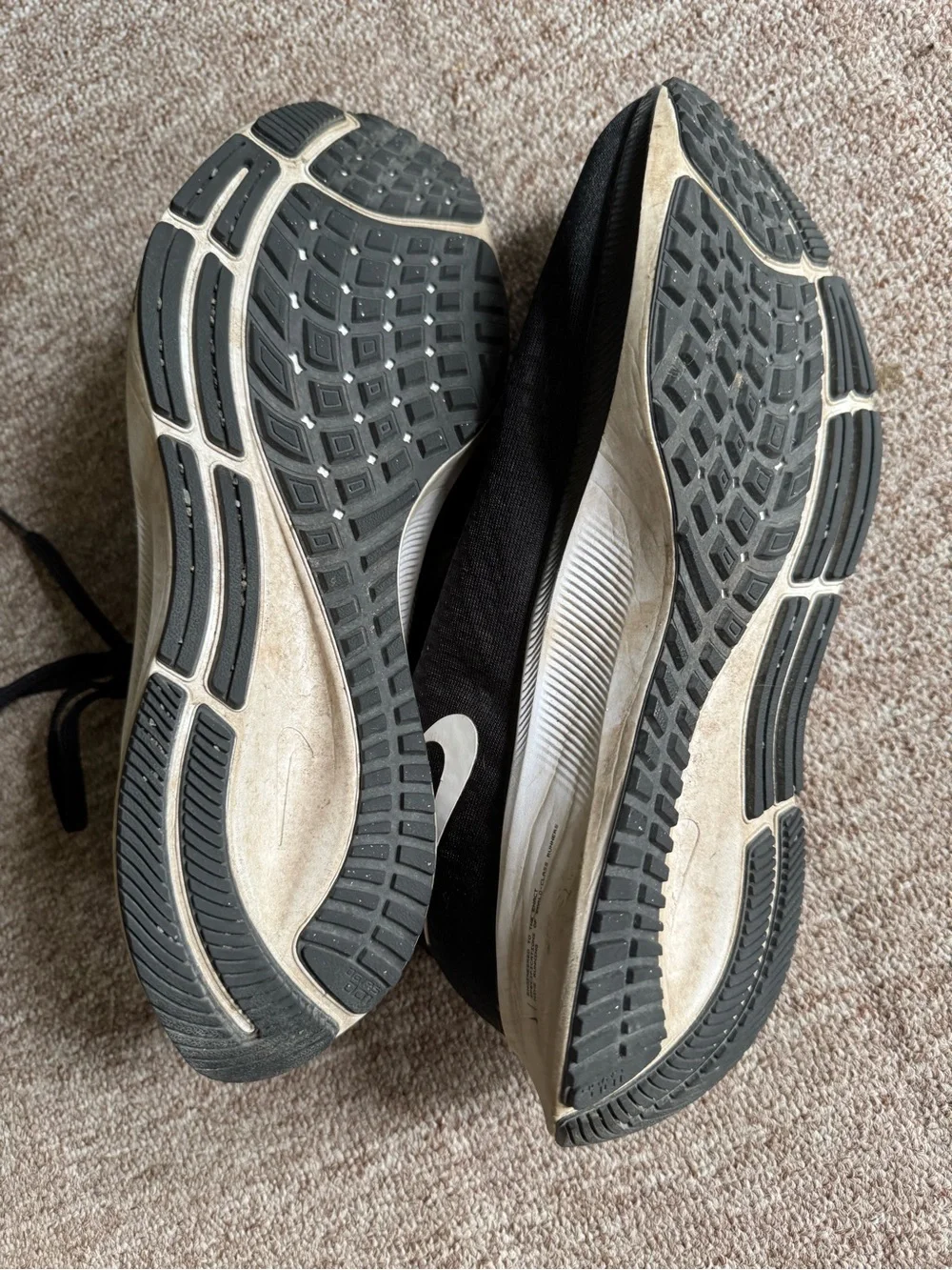 Nike Black Athletic Running Shoes with White Swoosh